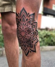 Mandala Knee tattoo.