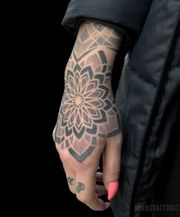 Hand mandala tattoo