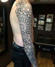 Full geometric dotwork tattoo sleeve. Mandalas och patterns mixed.